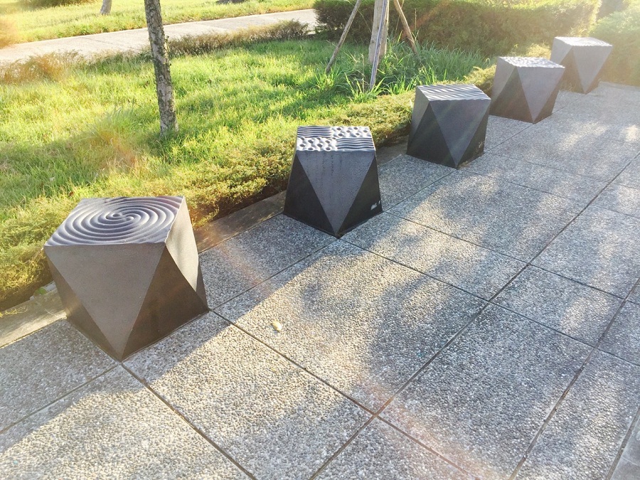 Geometric Ceramic Chair Decorated with Ripple Relief