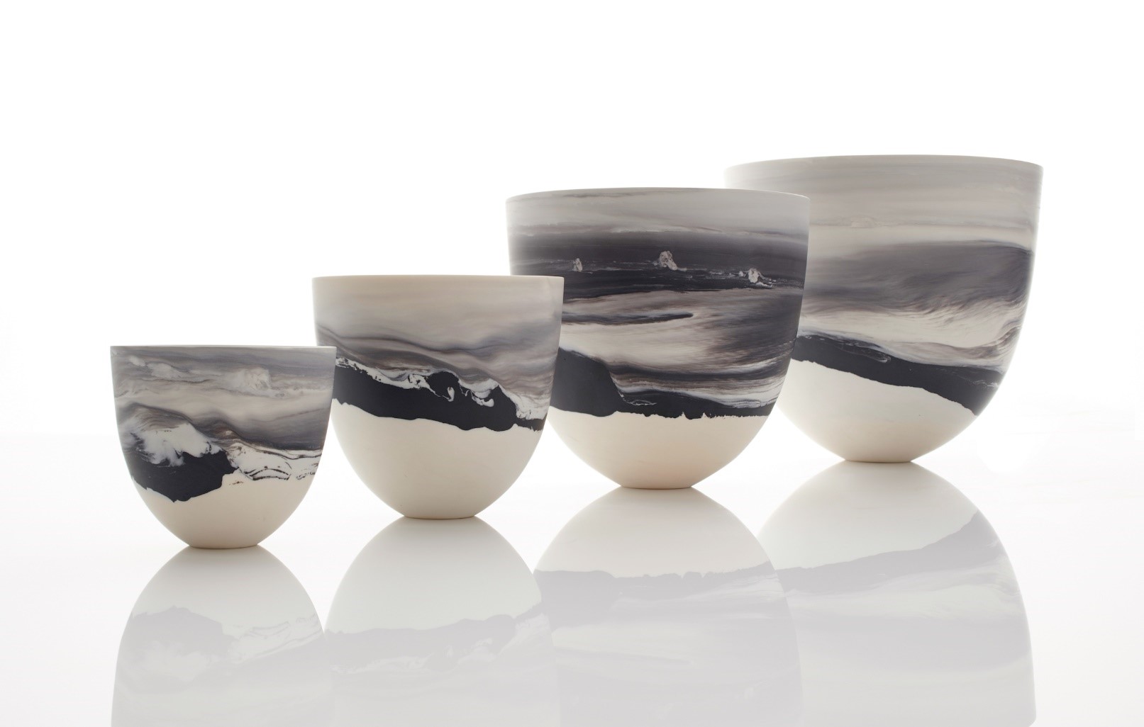 Porcelain Tides, 2018, porcelain, 8 x 8.5cm, 15 x 16.5cm, 17 x 18cm, 19 x 20 cm          